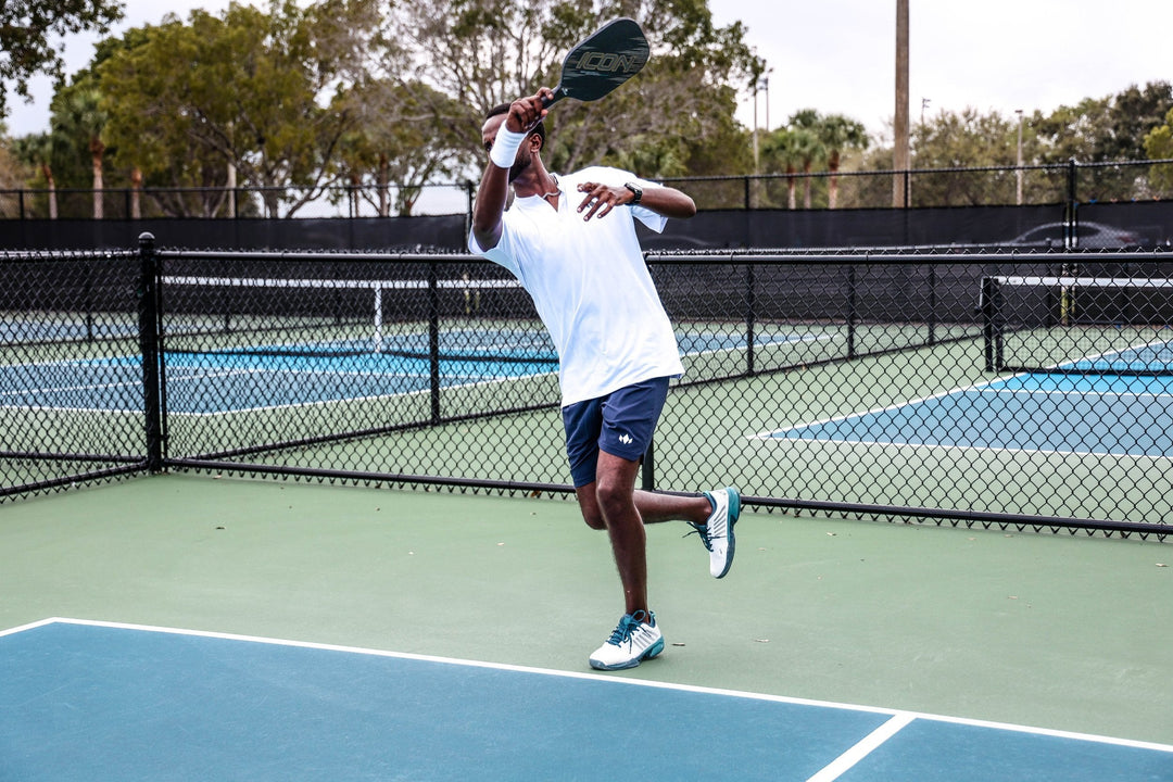 man playing pickleball with a pickleball paddle in the UK