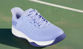 Skechers pickleball trainer shoe, on an outdoor court